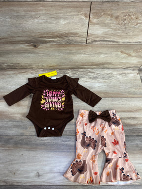 Baby Thanksgiving outfit with brown long-sleeve bodysuit and turkey print flared pants