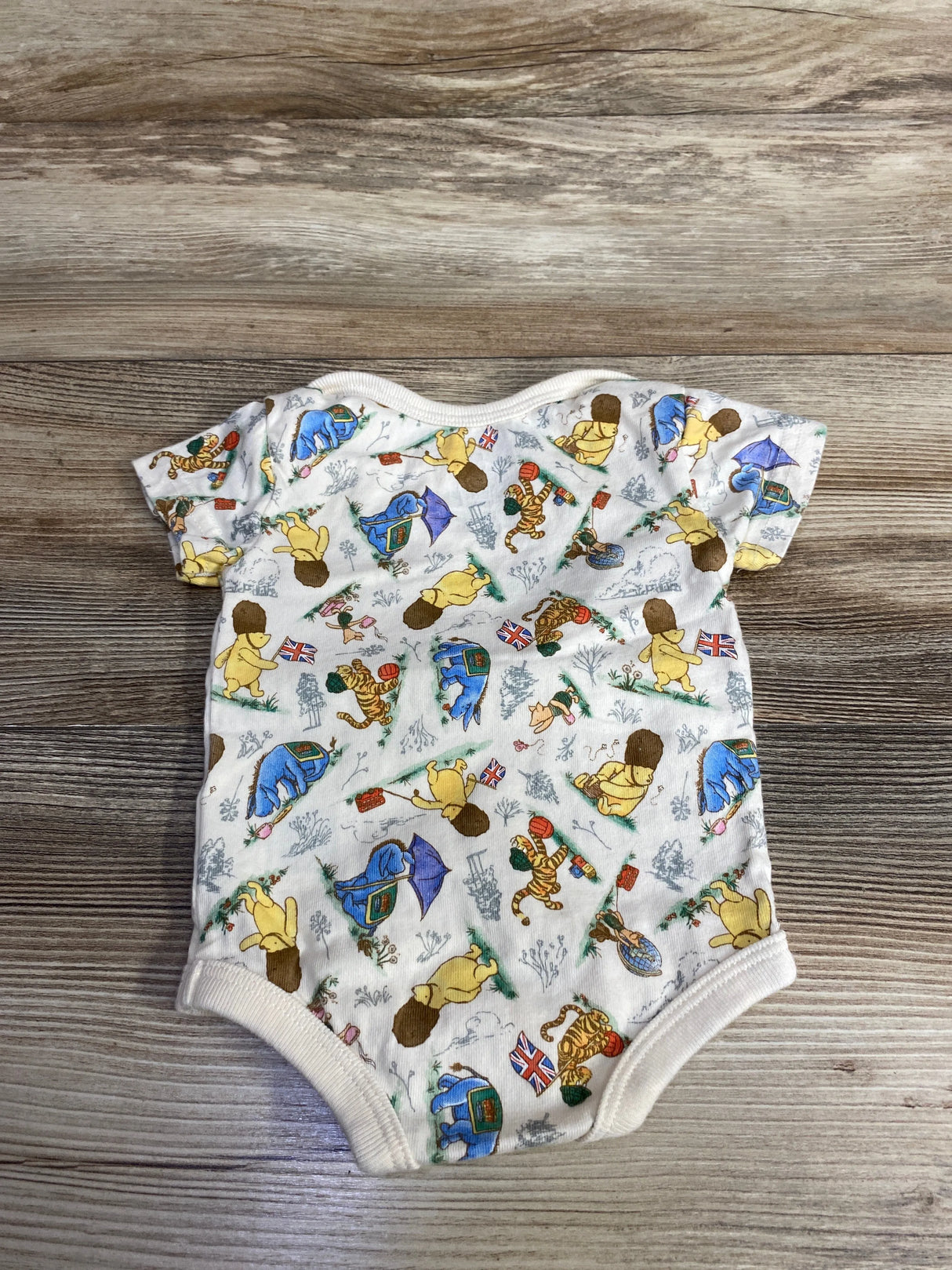 Disney Parks Winnie the Pooh British Flag Bodysuit Beige sz Newborn