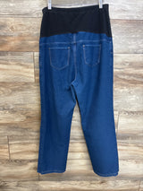 Back view of Time and Tru maternity jeans showing black panel waistband, blue denim, patch back pockets on wood floor