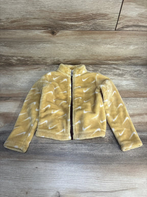 Yellow kids fleece jacket with white swoosh pattern, full zip, laid on wood floor