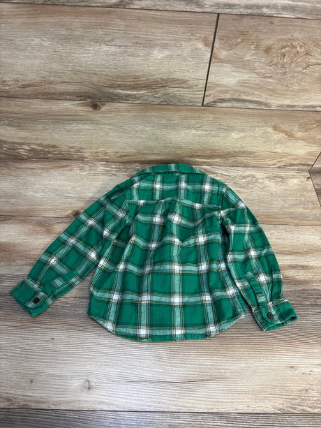 Back view of green Cat and Jack toddler plaid flannel button-up shirt showing long sleeves, button cuffs, and curved hem on wood floor