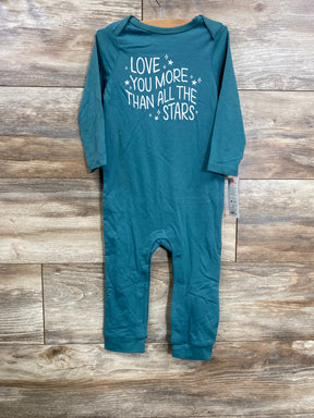 Teal long sleeve baby romper with 'Love you more than all the stars' text, wood background