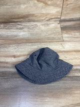 Flat-lay of Old Navy baby swim bucket hat size 0-6M showing blue heather fabric, stitched brim and side eyelets on wood floor