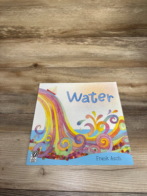 Children's book Water by Frank Asch with colorful swirling water art on wooden surface