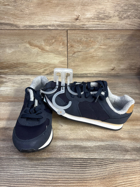 Side and front view of navy blue Cat & Jack toddler sneakers size 3Y showcasing white midsole and gray lining on wood floor