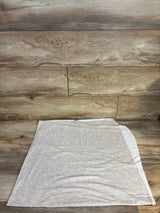 Gray kids t-shirt laid flat on wood floor, resale clothing for children