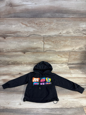 Black kids hoodie with colorful 'museum' graphic on wood floor background