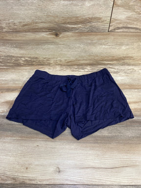 Flat lay of navy Gap Body maternity modal shorts showing elastic drawstring waistband and lightweight soft fabric on wooden floor