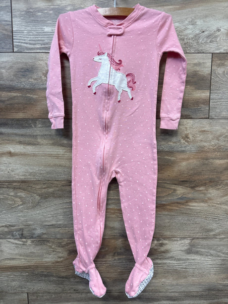 Front view of Carter’s pink unicorn sleeper, size 3T, with unicorn applique, star pattern, and footed legs on a wood floor