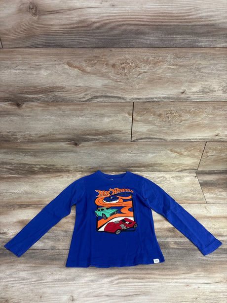 Front view of Baby Gap x Hot Wheels blue long sleeve shirt, size 5T, showcasing a three-car graphic on a wood background