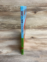 Spine of children's book titled Bobby the Bear and the Great Race by Ryan O'Connor on wood surface