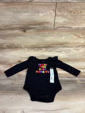 Black long-sleeve baby bodysuit with colorful text family time is my favorite, size 6 months, on wooden floor