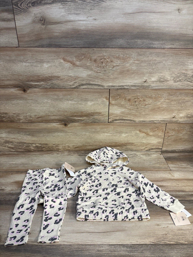 Kids leopard print hoodie and leggings set on wooden background