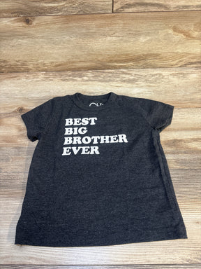 Black toddler t-shirt with 'Best Big Brother Ever' white text, laid on wood floor