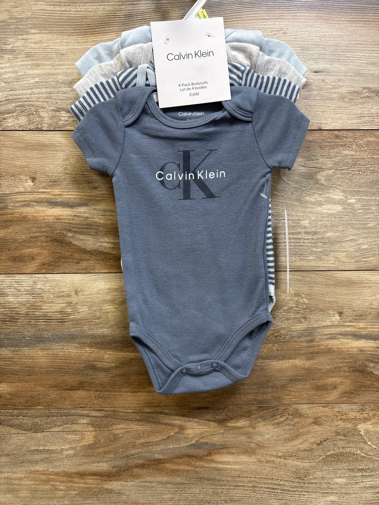 NEW Calvin Klein 4pk Bodysuits Blue sz 3/6m