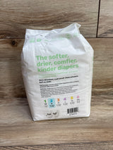 Rear view of Parasol Clear and Dry diaper pack showing headline 'The softer, drier, comfier, kinder diapers' and size 2 icon on wood background