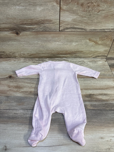 Back view of Old Navy knit footed sleeper in light pink showcasing long sleeves and built-in feet on wood background