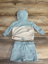 Baby two-piece set with light blue hooded top and matching shorts, soft cotton kids clothing