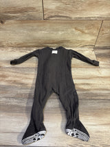 Front view of Burt’s Bees Baby grey waffle knit sleeper showcasing long sleeves and grippy footed soles on a wood floor