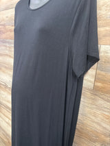 Black maternity t-shirt with short sleeves, displayed on mannequin over wood floor