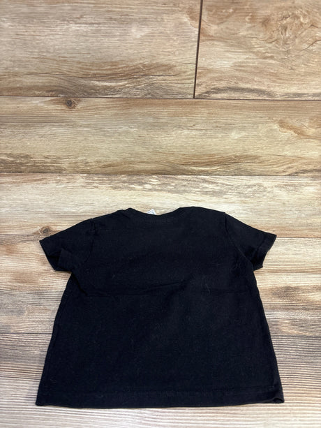 Back view of black Rabbit Skins suit shirt in size 3T showcasing short sleeves with a wood floor background