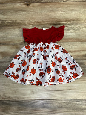 Flat-lay of red Shein toddler ruffle-sleeve dress with white rose-print skirt, size 12–18 months, on wood background