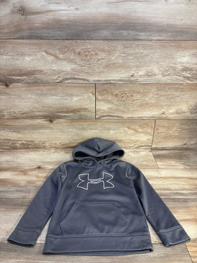 Gray Under Armour kids hoodie with white logo, laid on wooden floor