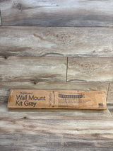 Superyard Wall Mount Kit Gray box on wood floor, kids safety gate accessory