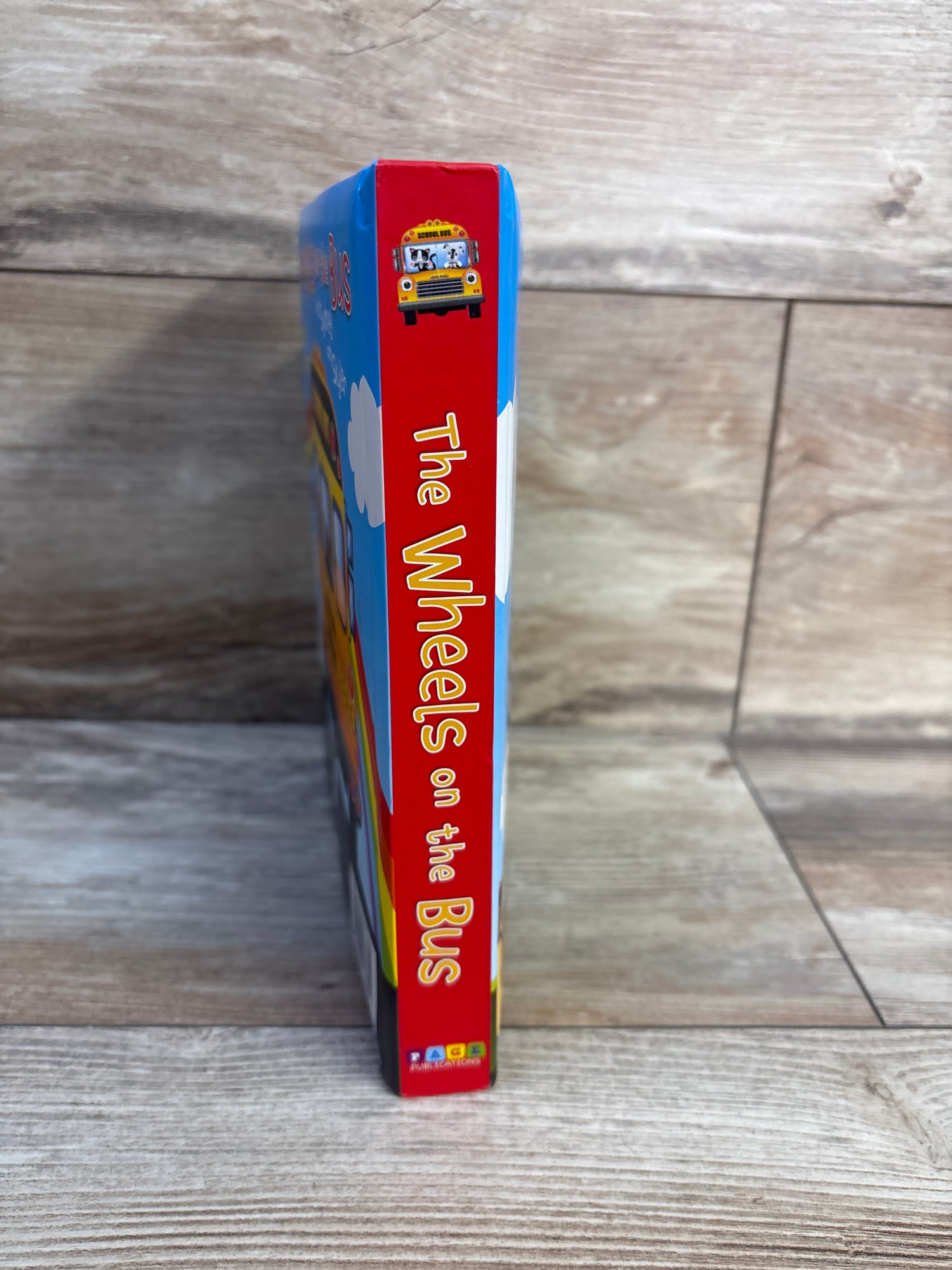 The Wheels on the Bus with Sydney and Skyler Padded Board Book