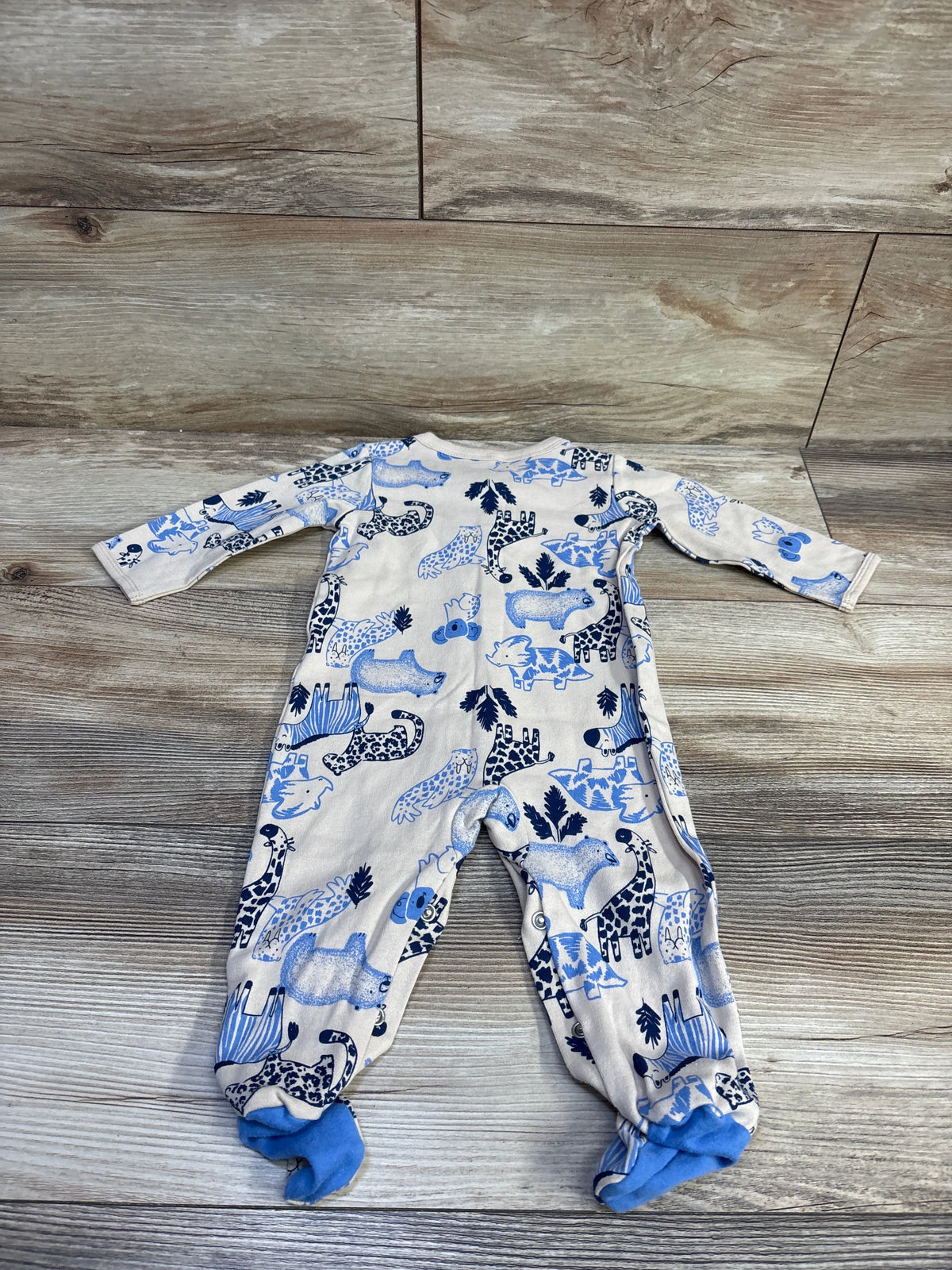 Tan Carter's snap sleeper for infants with blue animal print and footies