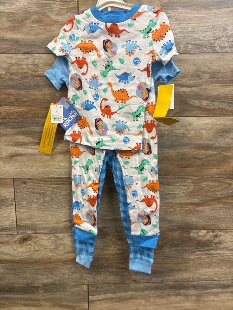 Front view of Ms Rachel 4-piece toddler pajama set showing colorful dinosaur and Ms Rachel portrait print, blue cuffed sleeves and blue checked leggings on wood floor