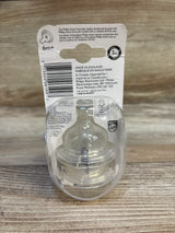 Front view of Philips Avent 2-pack anti-colic fast-flow nipples showing clear silicone design and 6m+ label on wood tabletop