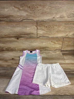 Flat lay of girls' AOBUTE tennis dress with purple-to-blue center panel and white elastic-waist shorts on wood floor