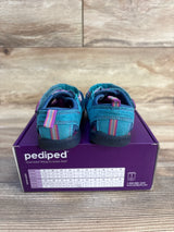 Blue toddler shoes with striped accents on a pediped shoe box, wooden background