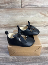 Black baby Mary Jane shoes with bows, soft sole, on box