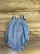 Front view of light blue Baby Starters romper with pinstripes, small floral print, navy bow straps and front buttons