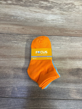 Pair of orange and blue Focus comfort socks for kids size 0-12 on wooden surface
