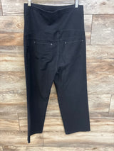 Black maternity pants with elastic waist and back pockets, ideal for comfort during pregnancy.