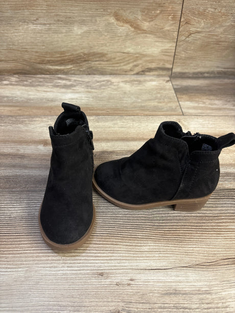 Front and side views of Wonder Nation black suede ankle boots with zip closures and stacked heels on a wood floor