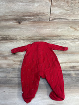 Back view of red Tommy Hilfiger newborn sleeper size 0-3M showcasing ribbed knit, small white dot pattern and footed legs on light wood floor
