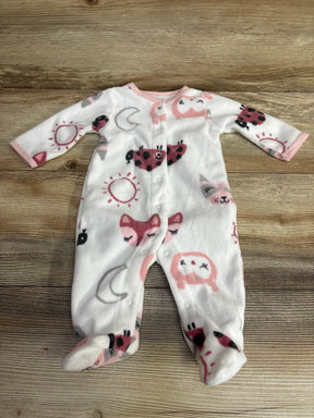 White baby fleece footed sleeper with pink and black animal and sun prints, snap closure
