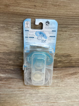 Packaged MAM baby pacifiers with blue accents on wood background, infant feeding essentials