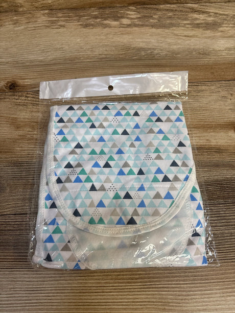 Blue green triangle pattern baby bib in clear packaging on wood surface