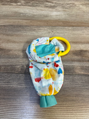 Colorful baby teether with paint splatter fabric and yellow ring, ideal for infant sensory play