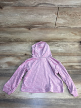 Pink kids hoodie with monogram pattern, soft fabric, laid on wood floor