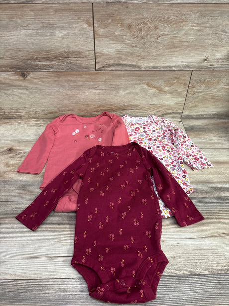 Set of three long sleeve baby bodysuits in red, pink, and floral patterns from Me n Mommy To Be.