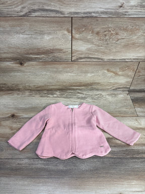 Pink baby jacket with zipper on wood floor, long sleeves, toddler outerwear fashion