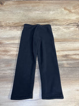 Black toddler leggings on wooden floor, kids clothing resale