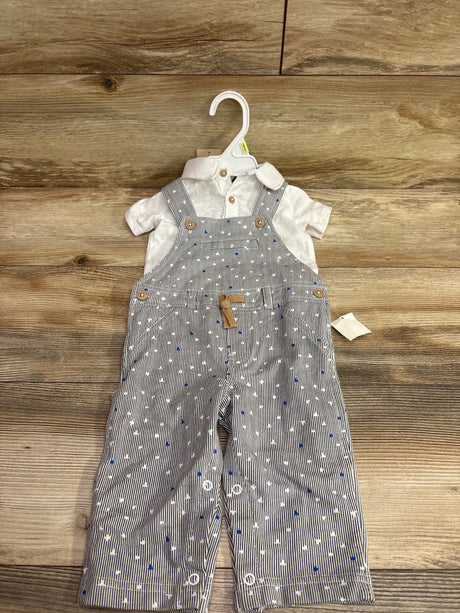 Front view of First Impressions polo shirt and overalls set, size 6 to 9 months, with striped overalls and white polo shirt