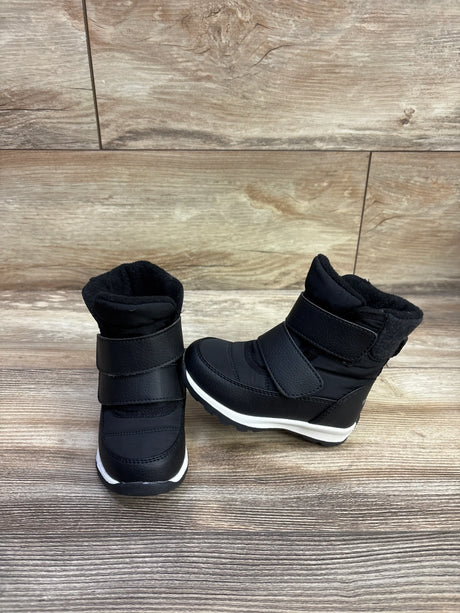 Front and side view of black Weestep winter snow boots showing double hook-and-loop straps and fleece lining on a wood floor